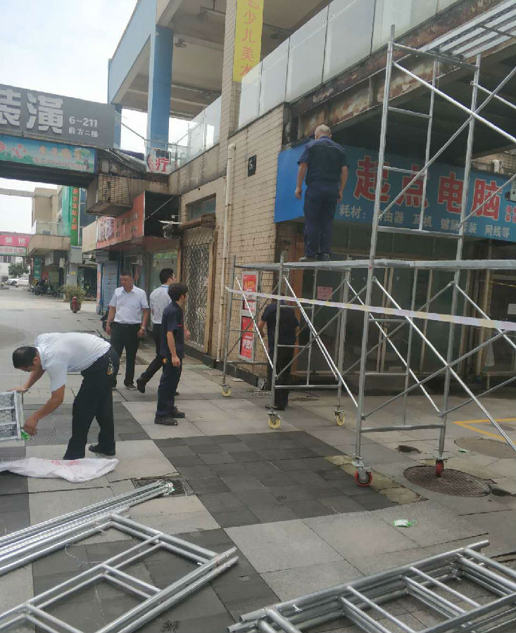 高溫下揮汗如雨 舊顔煥新貌